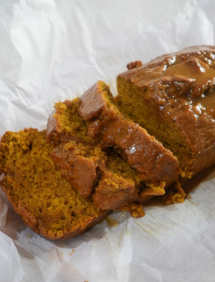Brown Butter Pumpkin Bread coated in maple glaze