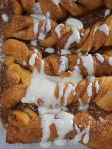 Cinnamon twists with savory cream cheese icing